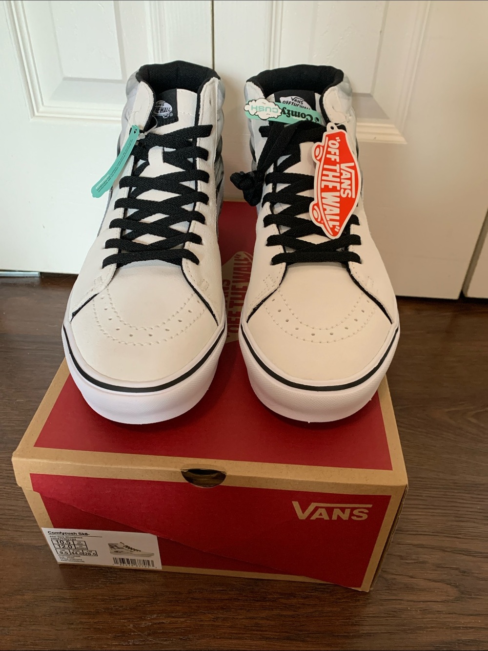 Vans White and Black High-Top Sneakers